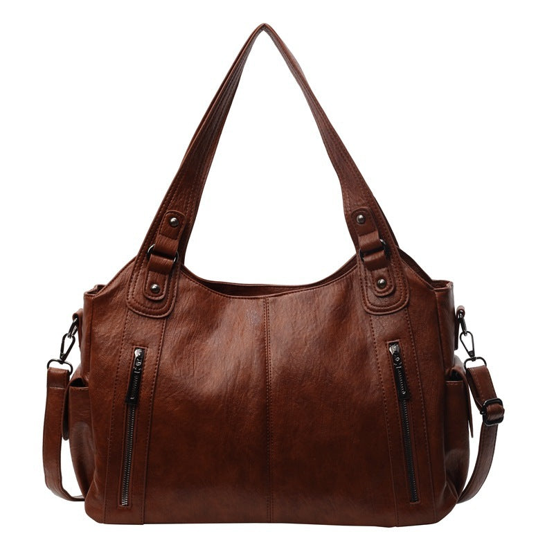 NOEMIE™ - Sac fourre-tout en cuir classique