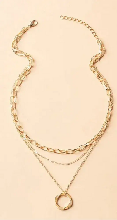 Collier vintage en chaîne dorée et pendentif